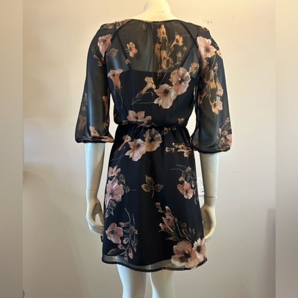 Pretty floral dress. Sheer with tank liner. Tassel details. Elastic waistband. - Picture 10 of 13